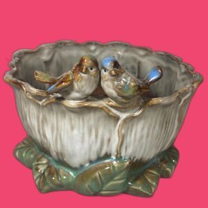 Majolica-style ceramic planter with lovebirds two birds perched cabbage leaves